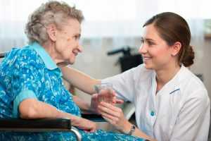 Caregiver Taking Care Senior Woman