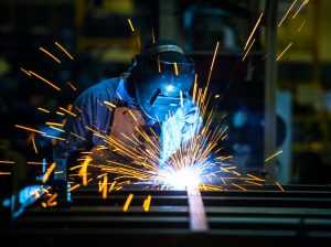 Man working on a steel product