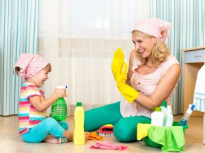 Mother and daughter doing home clean up