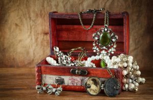 Vintage jewelry in antique wooden jewelry box