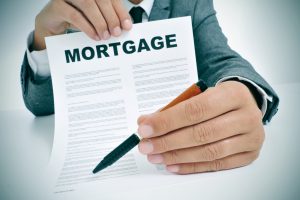 man showing a mortgage contract