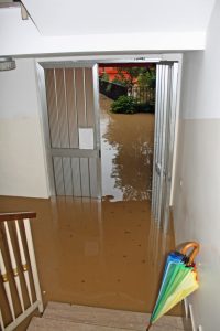 front porch of house flooded