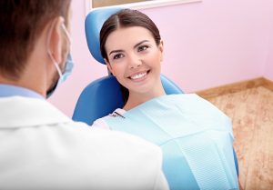 Woman listening to dentist's advice