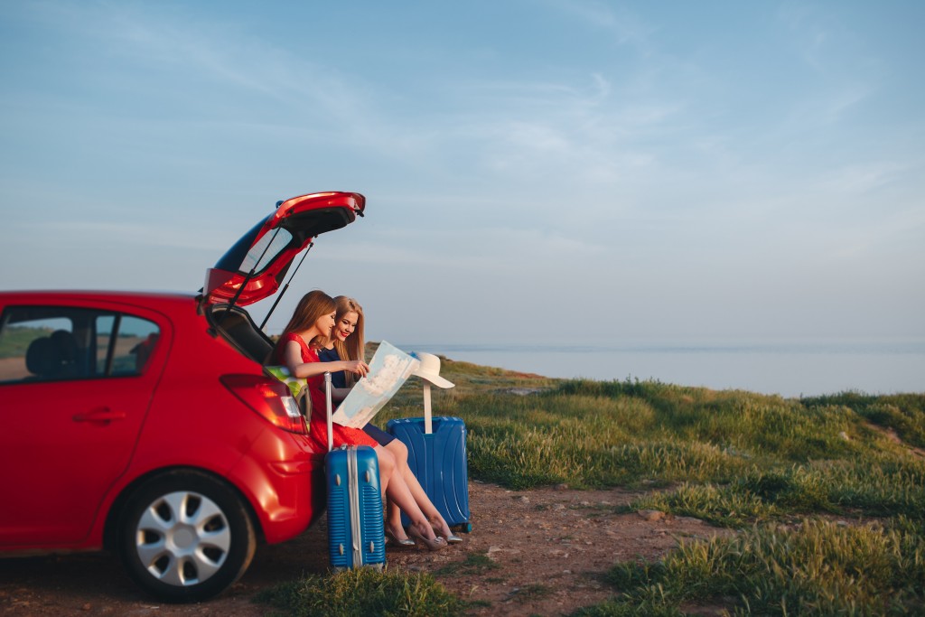 Travellers on a rental car